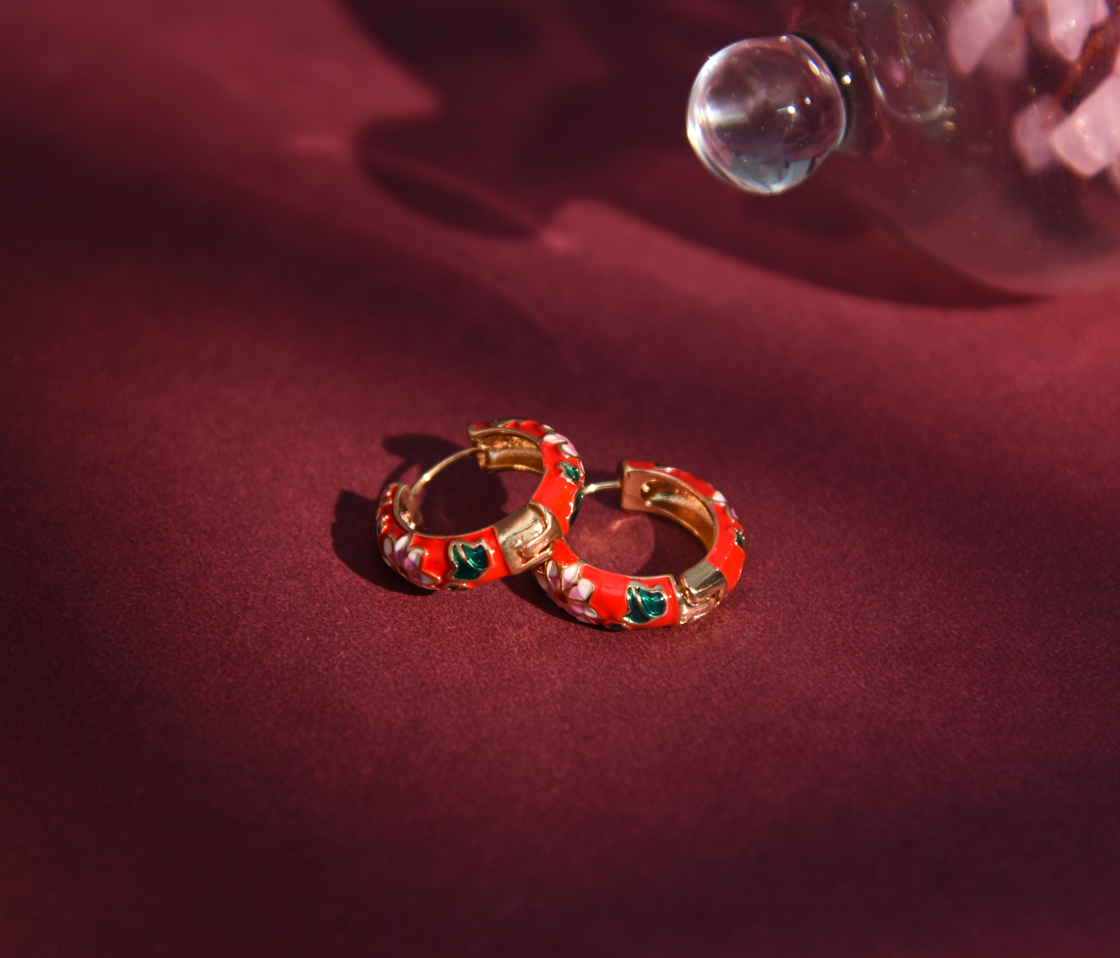 Red enamel floral loop earring