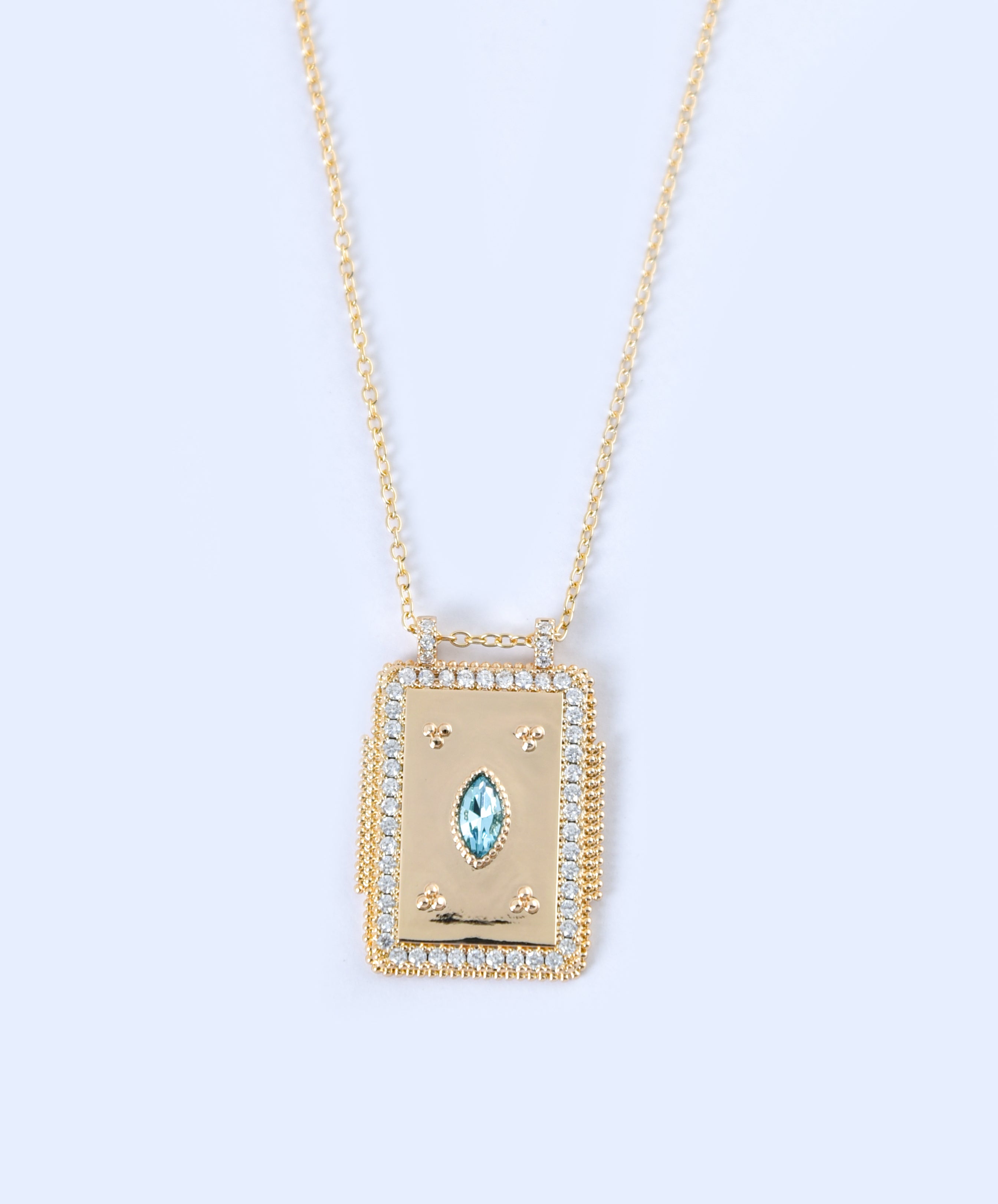 Golden Pendant with Blue Zircon