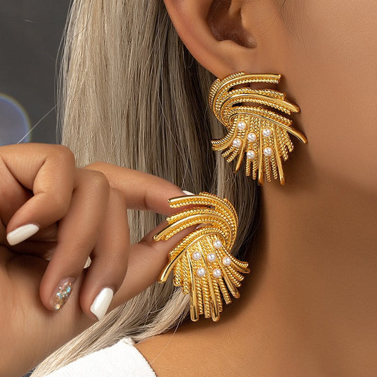 gold earrings with pearl studs