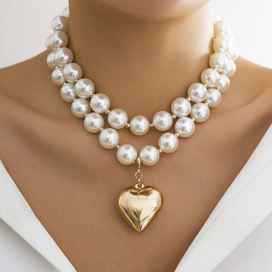 pearl beaded necklace with golden heart