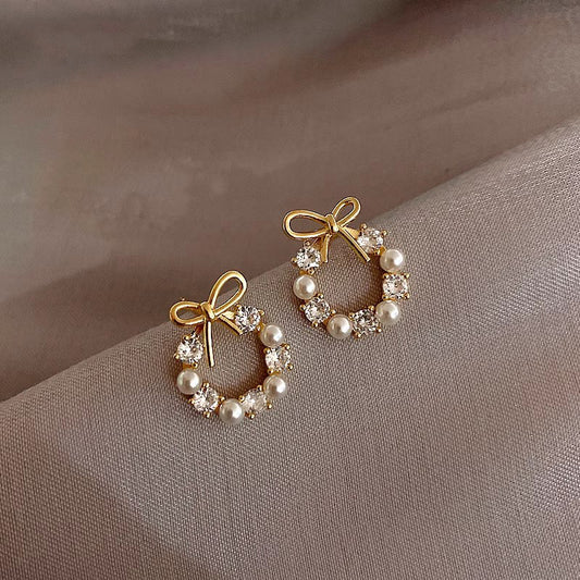 Round Zirconia & Pearls loops, Tied with a Charming Bow